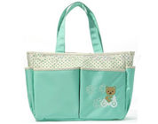 Açık Yeşil Kumaş Sevimli Şık Bebek Değiştiren Çantalar Önünde nakış logosu